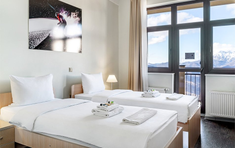 Номер Комната с балконом в 3-комнатном номере c общим санузлом, фото 2