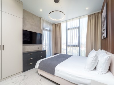 Апартаменты Люкс (2 спальни) 6-местный 3-комнатный. Этажи 14,15,16. гостиная объедененная с кухней, обрудованной обеденной зоной и 2мя спальнями, фото 2