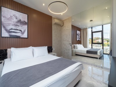 Апартаменты Люкс (2 спальни) 6-местный 3-комнатный. Этажи 14,15,16. гостиная объедененная с кухней, обрудованной обеденной зоной и 2мя спальнями, фото 5