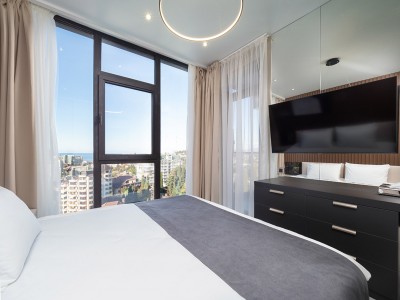 Апартаменты Люкс (2 спальни) 6-местный 3-комнатный. Этажи 14,15,16. гостиная объедененная с кухней, обрудованной обеденной зоной и 2мя спальнями, фото 7