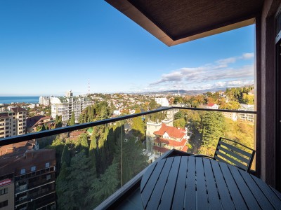 Апартаменты Люкс (2 спальни) 6-местный 3-комнатный. Этажи 14,15,16. гостиная объедененная с кухней, обрудованной обеденной зоной и 2мя спальнями, фото 15